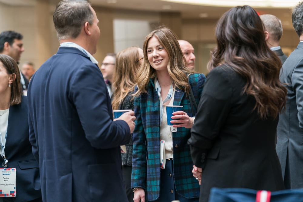 Members in conversation at a Pub K event